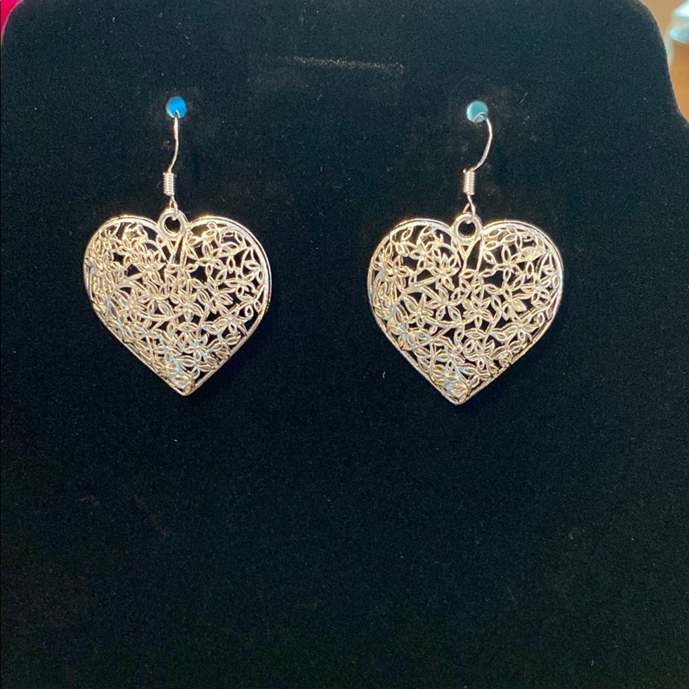 Pierced Silver-toned Filigree Heart Earrings with Intricate Design